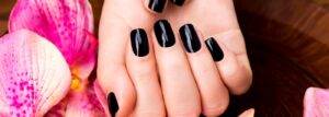 beautiful-women-hands-with-black-manicure-after-spa-procedures-spa-treatment-concept (1)