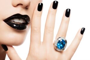 macro-shot-woman-s-lips-nails-painted-bright-color-black (1)